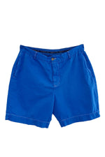 Load image into Gallery viewer, flat lay of the front side of bright blue men&#39;s shorts
