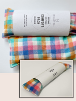 Load image into Gallery viewer, Two grain bags filled with cherry pits; one for shoulders and one eye pillow with white labels. In a colorful, bright plaid fabric. 
