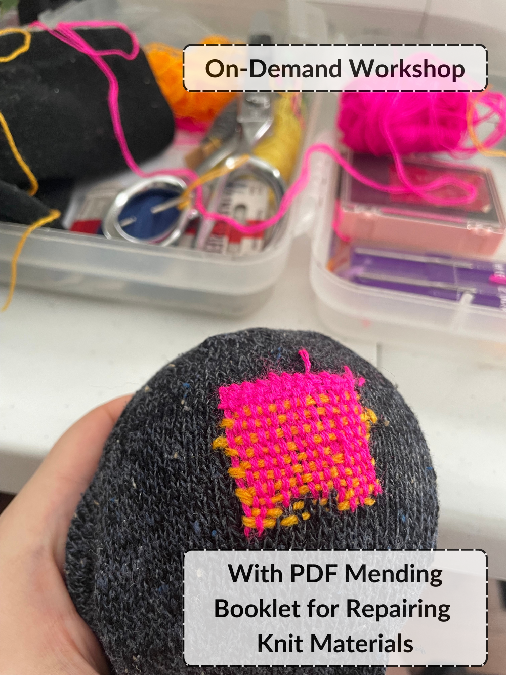 Hot pink and yellow darn on grey sock. Mending supplies in the background. Text: On-demand workshop. With PDF mending booklet for repairing knit materials