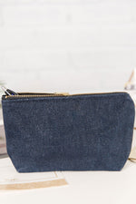 Load image into Gallery viewer, Navy blue zippered pouch with a pen coming out of it. 
